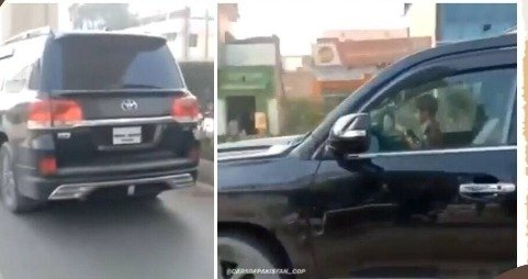 video of 5 year old kid driving SUV