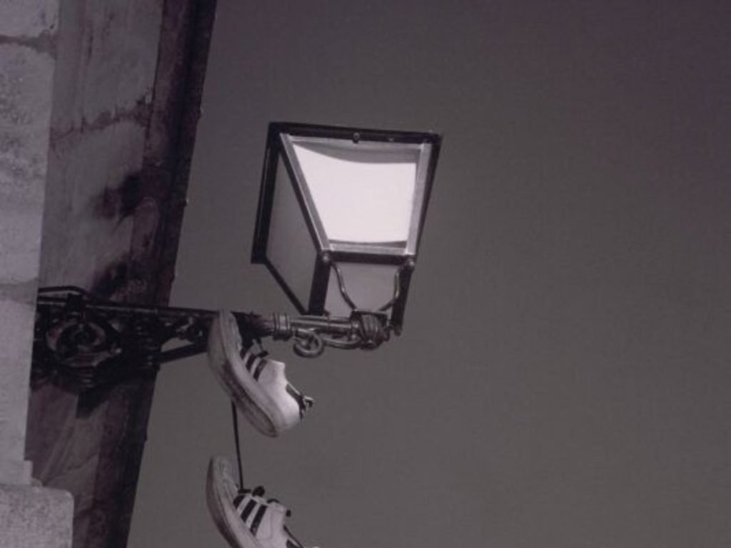 shoes hanging on wire