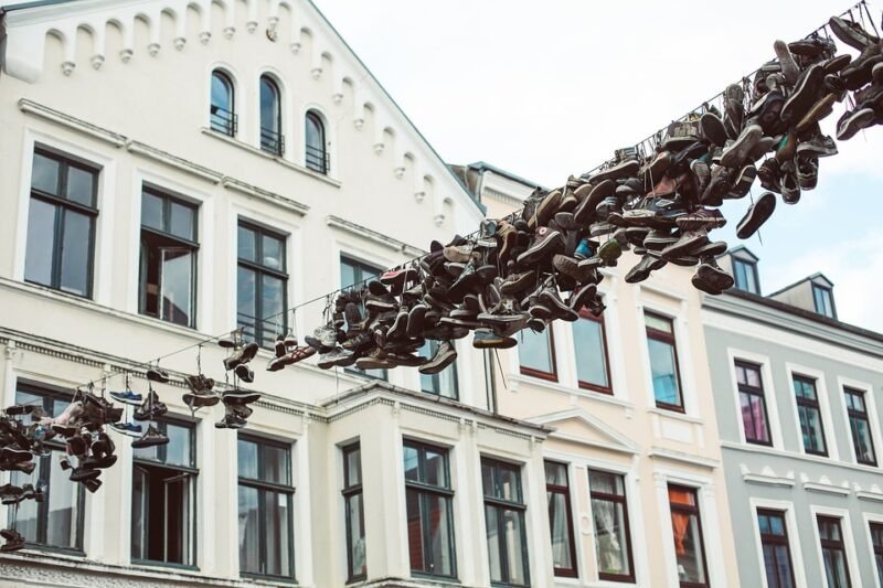 Shoes hanging on wire