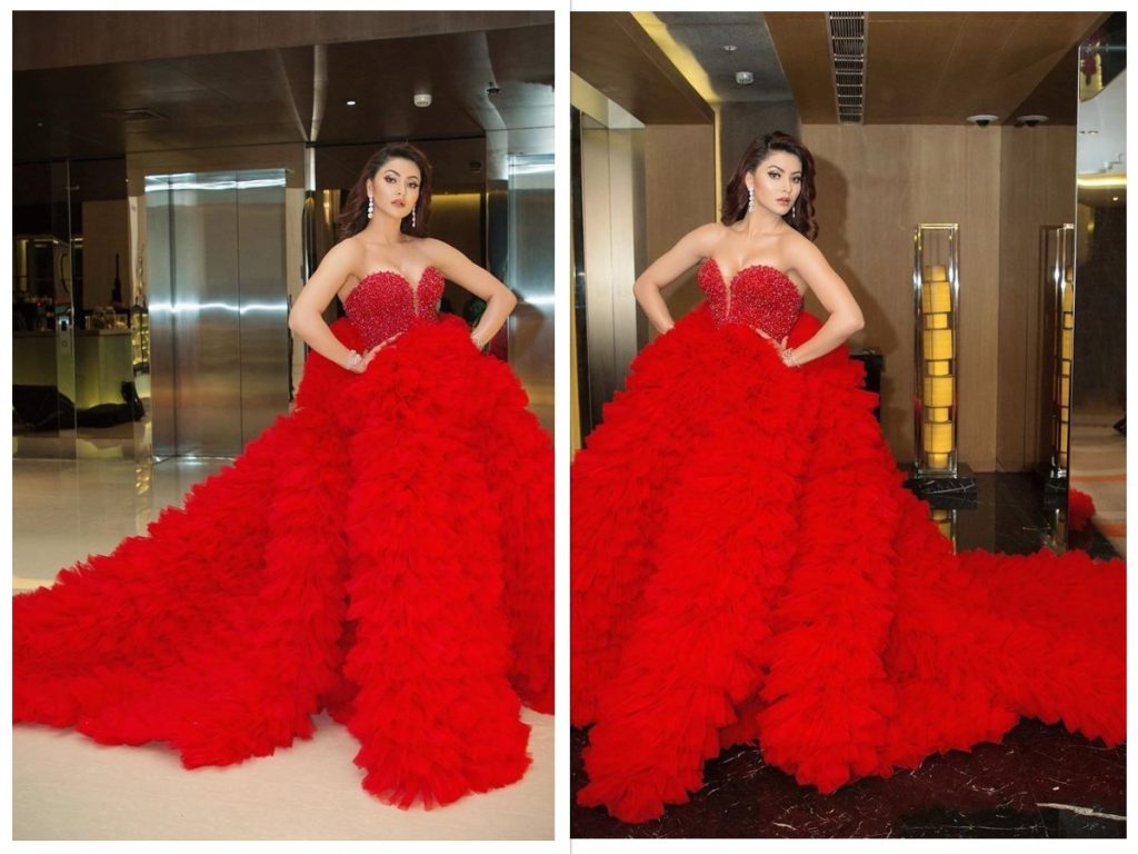 urvashi rautela wears red gown sits on 4 chairs filmfare 2020