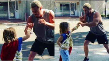 Chris Hemworth with son
